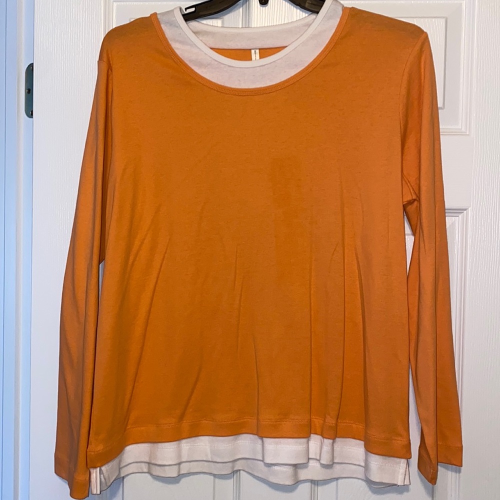Light orange long sleeve top